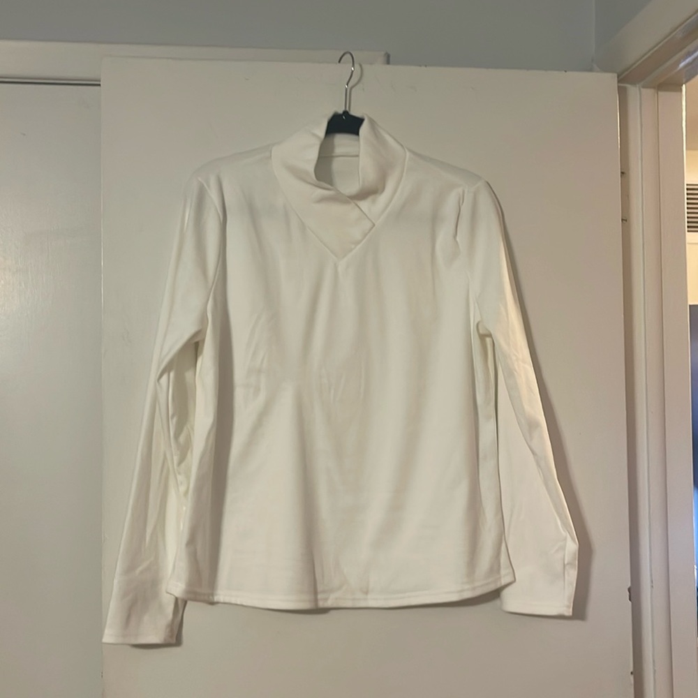 Nwot  A cream color turtleneck XL never been worn